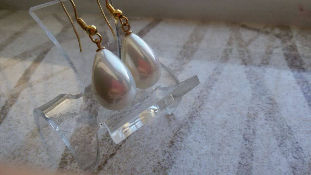 זוג עגילים מיורקה לאהבה ורגיעות בצבע שנהב